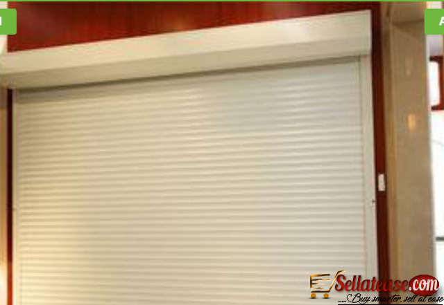 White Perforated Rolling Shutters Garage Door BY HIPHEN SOLUTION