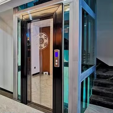 4-Stop Hydraulic Gearless Home Lift for Contemporary Architecture by hiphen